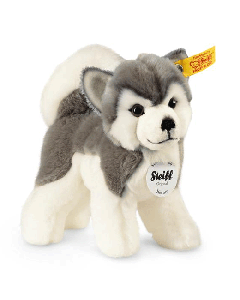 Steiff's Bernie the Husky Soft Plush Toy is made with polyester and is a small stuffed animal that is a great gift for children and babies. 