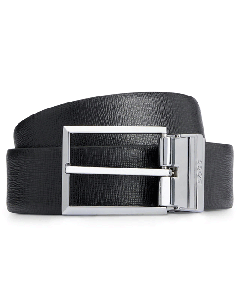This BOSS Interchangeable Plaque & Pin Buckle Reversible Belt Black has textured saffiano leather on one side and plain black leather on the other. 
