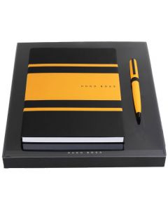 This Yellow Gear Matrix A5 Notebook & Ballpoint Pen Set is designed by Hugo Boss. 