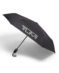 TUMI's Auto Close Medium Umbrella has the brand name on the top and red accents on the interior.