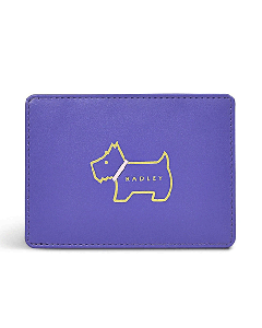 Radley's Heritage Dog Outline Purple Travel Card Holder is made out of smooth leather.